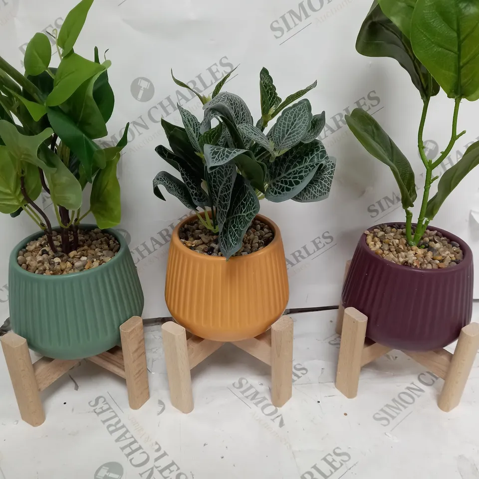 SET OF 3 ARTIFICIAL POTTED FLOWERS ON WOODEN STANDS