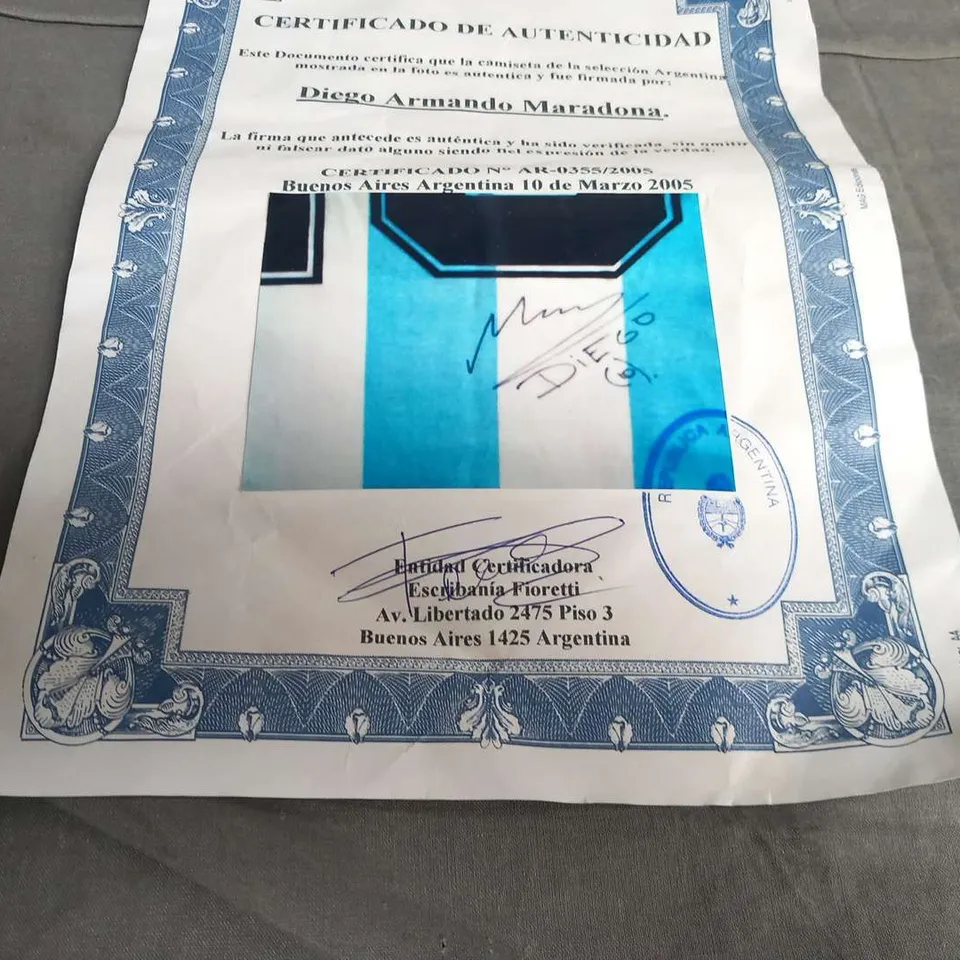 1994 ARGENTINA ADIDAS HOME FOOTBALL JERSEY NUMBERED 10 SIGNED BY DIEGO ARMANDO MARADONA WITH CERTIFICATE OF AUTHENTICITY