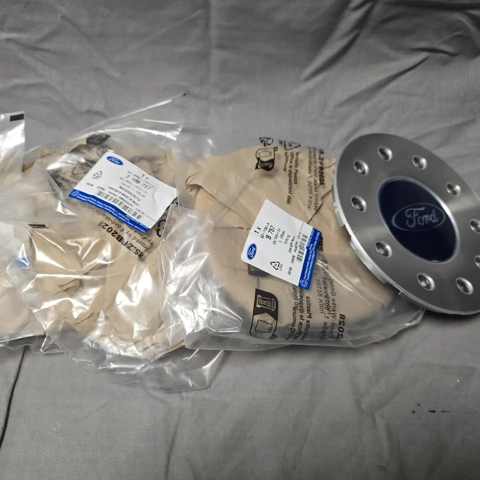4 X FORD BRANDED WHEEL COVERS 