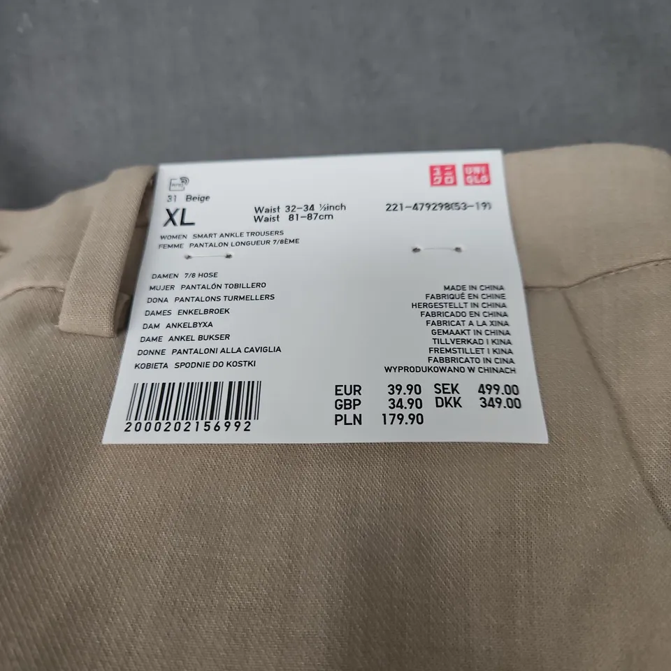 UNIQLO WOMEN’S BEIGE SMART ANKLE TROUSERS – XL (WAIST 32–34½ IN / 81–87 CM)