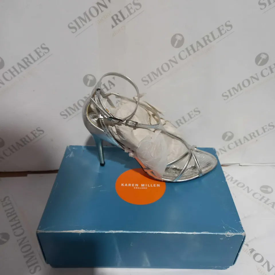 BOXED PAIR OF KAREN MILLEN SILVER SANDAL SIZE 39
