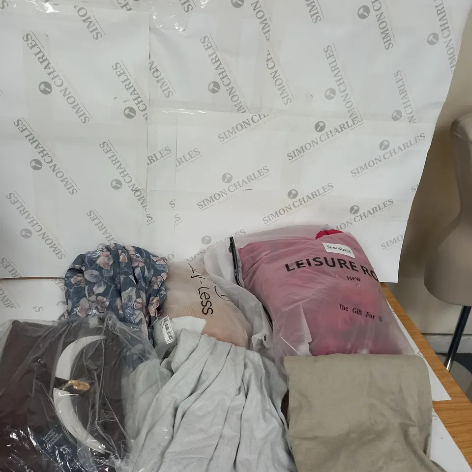 LARGE BOX OF ASSORTED CLOTHING ITEMS IN VARIOUS COLOURS AND SIZES INCLUDING TROUSERS , TOPS AND JUMPERS 