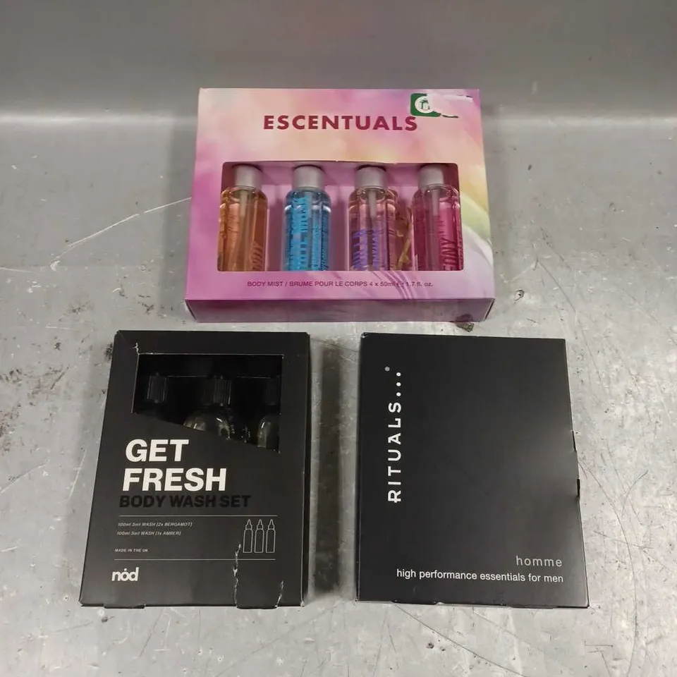 LOT OF 3 ASSORTED COSMETIC BOXSETS TO INCLUDE - ESCENTUALS BODY MIST - NOT GET FRESH BODY WASH SET - RITUALS HIGH PERFORMANCE ESSENTIALS FOR MEN