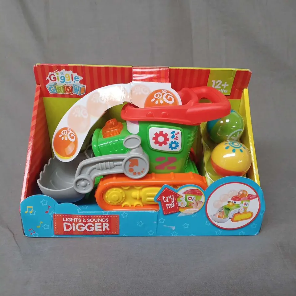 GIGGLE AND GROW - LIGHTS AND SOUNDS DIGGER