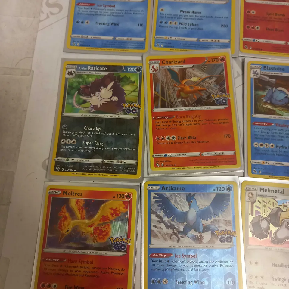 LOT OF 24 ASSORTED POKEMON CARDS
