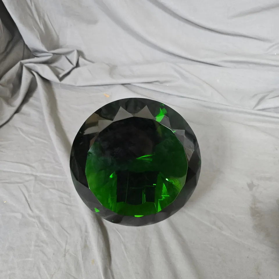 GREEN FACETED GLASS GEM SCULPTURE ON CLEAR ACRYLIC BASE