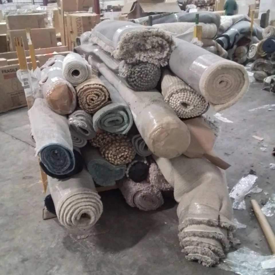 STILLAGE OF APPROXIMATELY 20 QUALITY DESIGNER RUGS