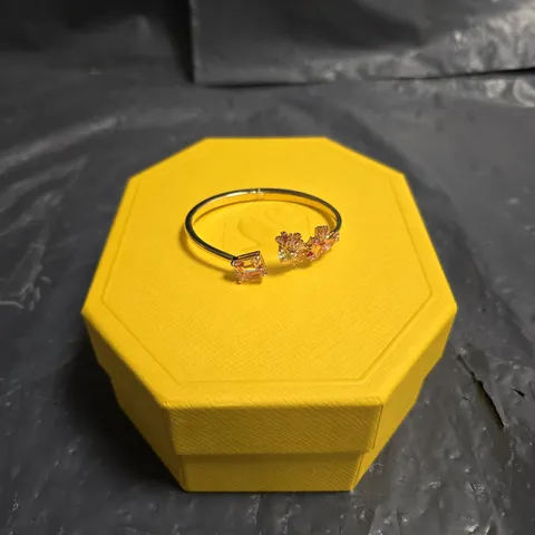 SWAROVSKI GOLD-TONE BANGLE WITH CLEAR CRYSTALS – BOXED