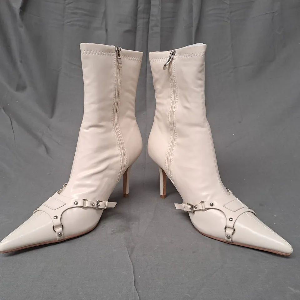 BOXED PAIR OF EGO KELSET POINTED TOE HEELED BOOTS IN BEIGE UK SIZE 6