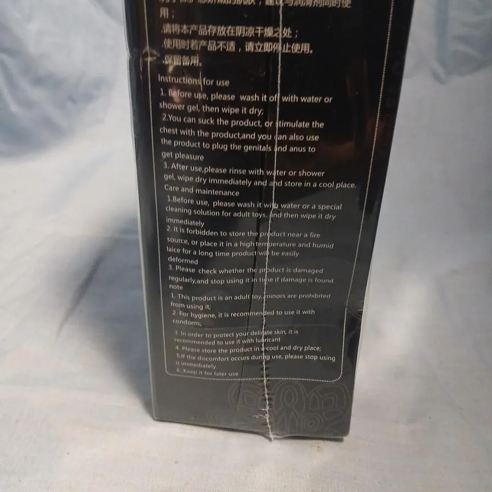 ADULT NOVELTY SEX TOY IN BLACK BOX – BILINGUAL PACKAGING WITH 'REALLY SOFT', 'FLEXIBLE ENOUGH'