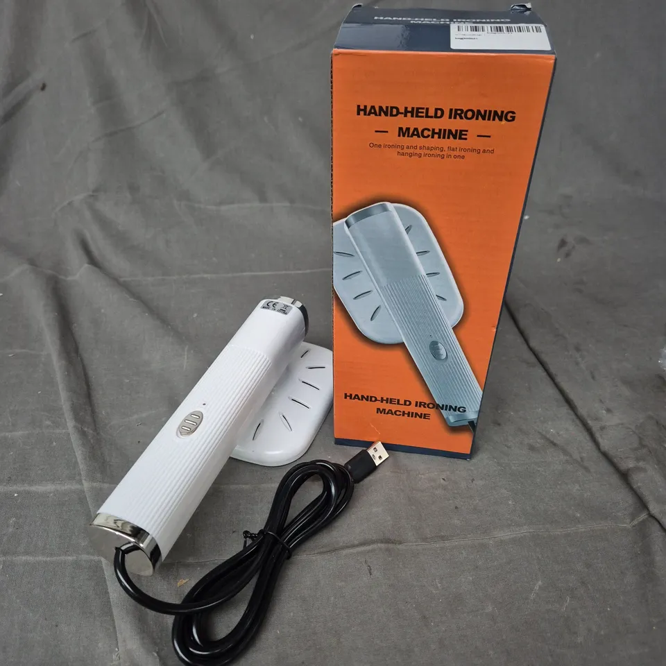 BOXED HAND-HELD IRONING MACHINE