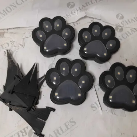 BOXED BELL AND HOWELL SET OF 4 SOLAR PAW LIGHTS