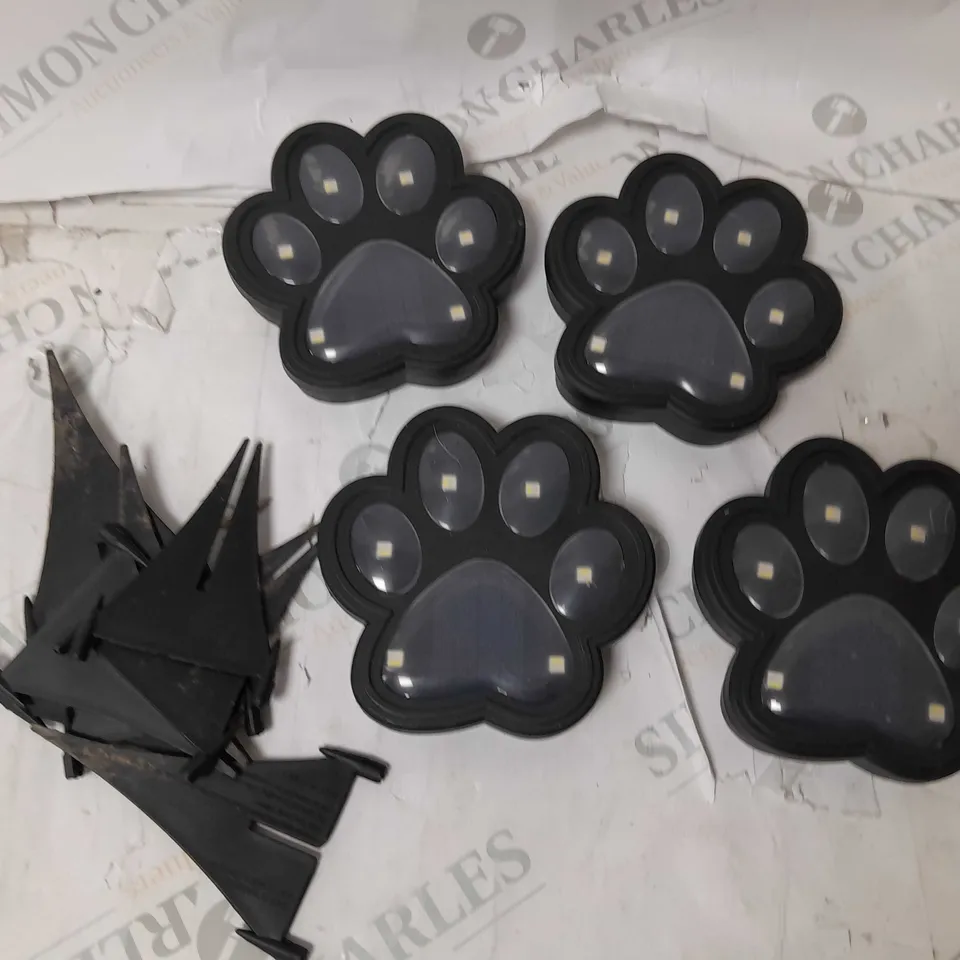 BOXED BELL AND HOWELL SET OF 4 SOLAR PAW LIGHTS