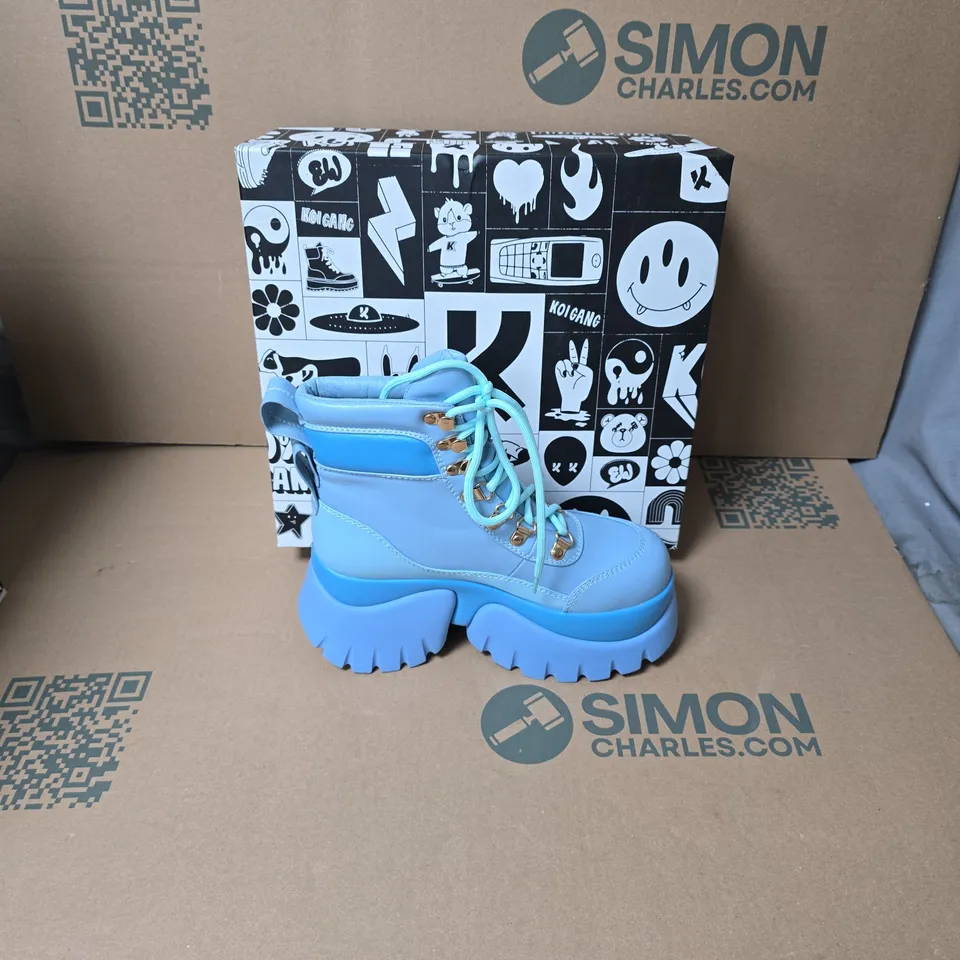 BOXED KOI CRYBABY BLUE VILUN PLATFORM BOOTS UK SIZE 4