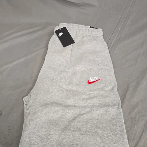 NIKE LOGO FLEECED TRACKSUIT BOTTOMS SIZE L