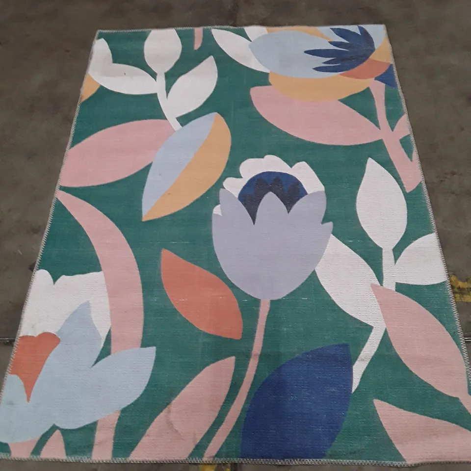 FLORAL PATTERNED RUG - GREEN BACKGROUND WITH PASTEL PINK, BLUE AND CREAM FLOWERS 160X125CM APPROX