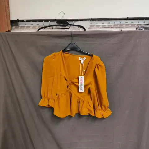 BOX OF APPROXIMATELY 48 URBAN BLISS MUSTARD WRAP BLOUSE WITH RUCHED RUFFLE HEM – WOMEN'S TOP - SIZES 8 /16 