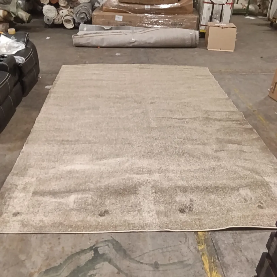 STILLAGE OF DESIGNER RUGS APPROXIMATELY 15 LARGE RUGS