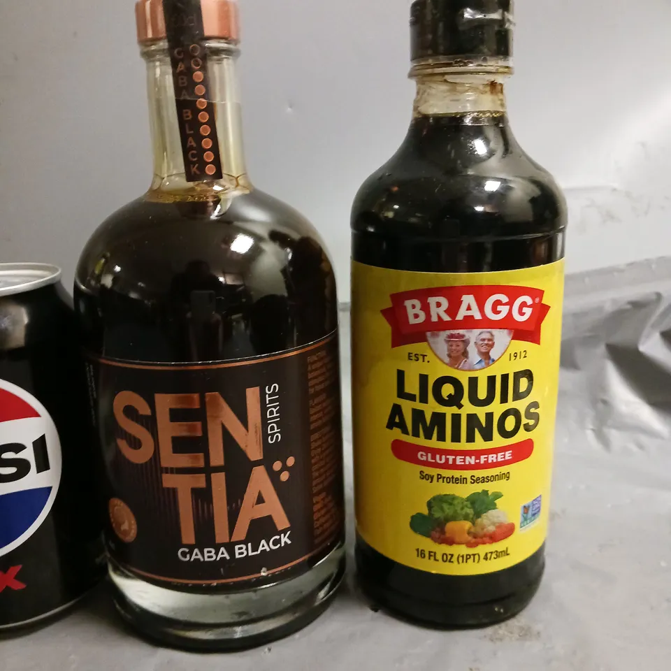 LOT OF ASSORTED DRINK ITEMS TO INCLUDE BRAGG LIQUID AMINOS AND GABA BLACK SUPPLEMENT 