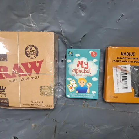 APPROXIMATELY 10 ASSORTED HOUSEHOLD ITEMS TO INCLUDE MY ALPHABET FLASH CARDS, RAW CLASSIC ROLLING PAPERS, ETC