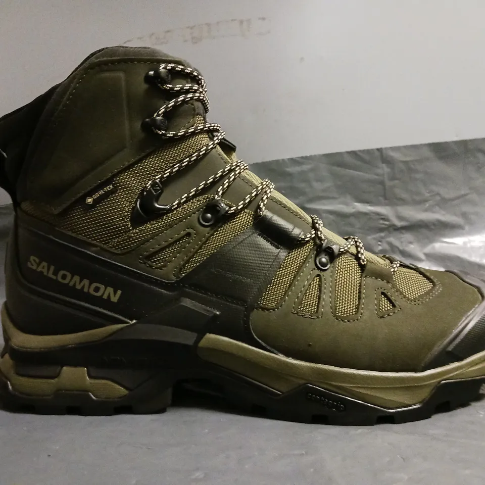 BOXED PAIR OF SALOMON ANKLE BOOTS IN GREEN SIZE UK 10.5