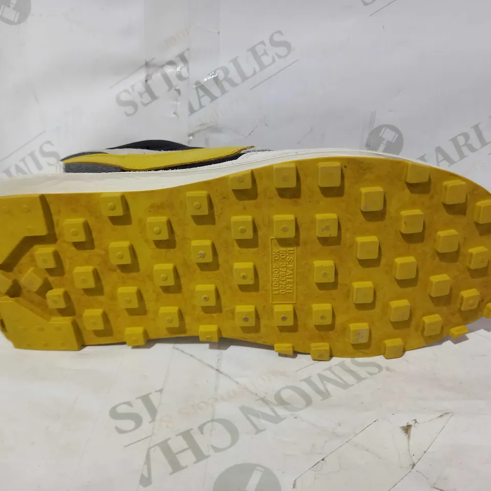 BOXED PAIR OF NIKE TRAIERS IN BLACK/YELLOW UK SIZE 7.5