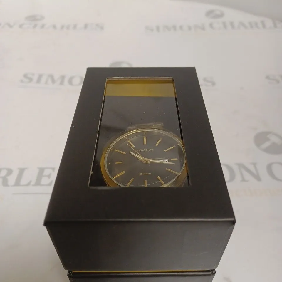 BOXED SEKONDA BLACK & GOLD CIRCULAR WATCH 
