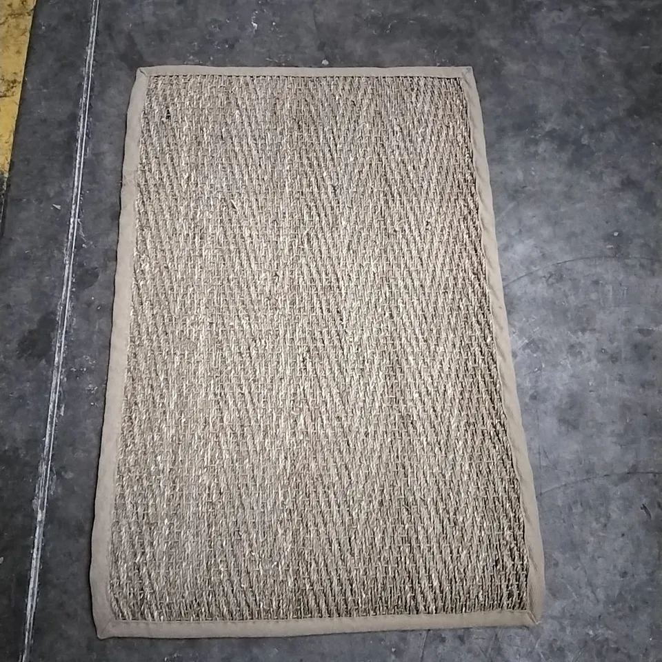 EMMALINE SOLID COLOUR HAND WOVEN ARE RUG APPROXIMATELY 90X60CM