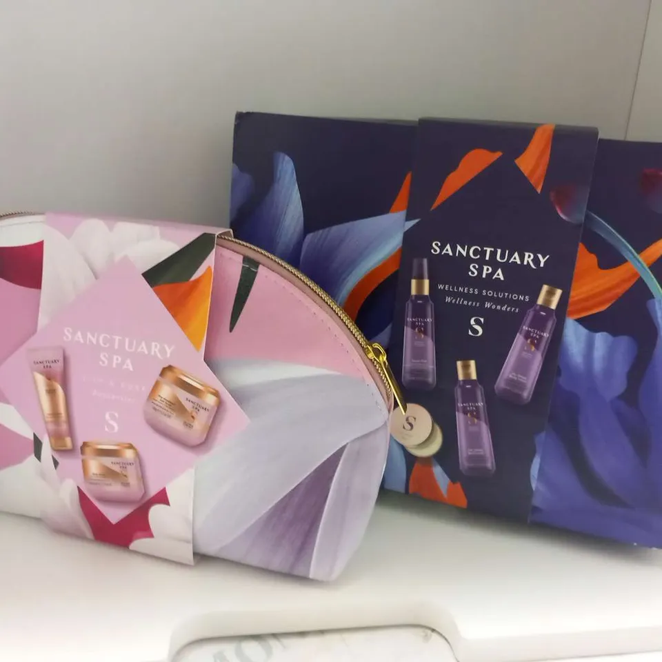 TWO ASSORTED SANCTUARY SPA GIFT SETS TO INCLUDE; WELLNESS SOLUTIONS WELLNESS WONDERS AND LILY AND ROSE FAVOURITES