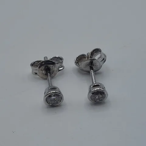 18CT WHITE GOLD RUB OVER STUD EARRINGS SET WITH NATURAL DIAMONDS