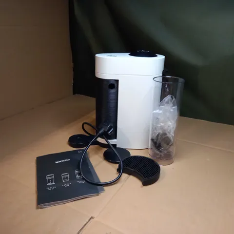 NESPRESSO BLACK/WHITE COFFEE MACHINE