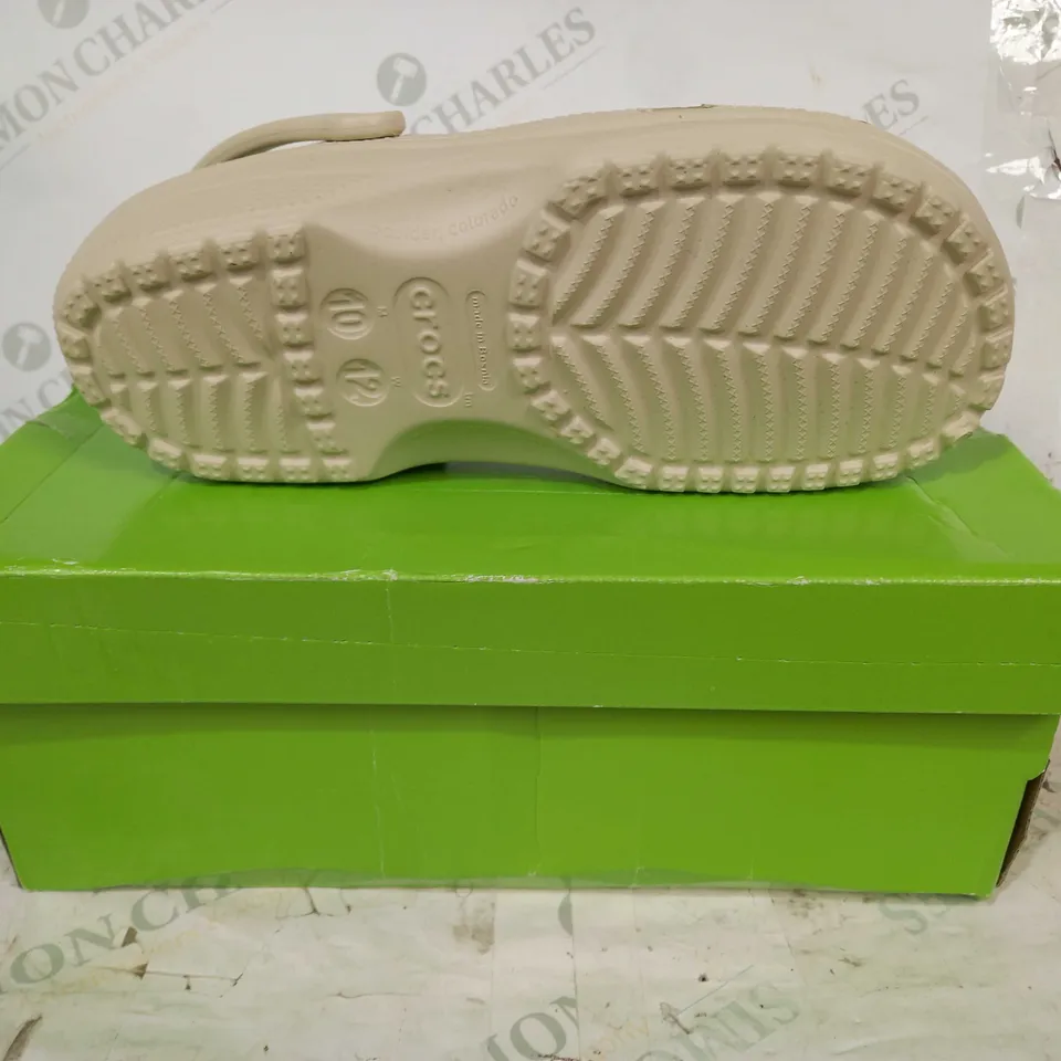BOXED PAIR OF CROCS IN BEIGE UK SIZE M9/W10