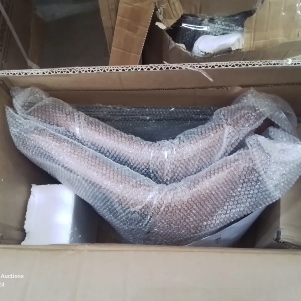 A BOXED PAIR OF BROWN FAUX LEATHER UPHOLSTERED DINING CHAIRS 