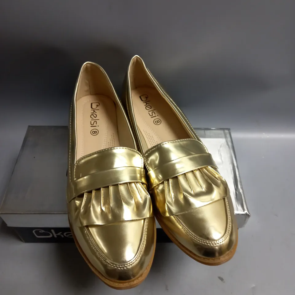 BOXED KELSI LADIES FLAT GOLD BROGUES. SIZE 8