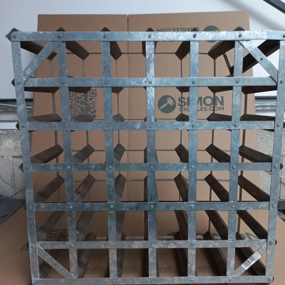 WINE RACK WITH A LIKELY 42-BOTTLE CAPACITY UNIT WITH WEATHERED WOOD AND RIVETED METAL FRAME