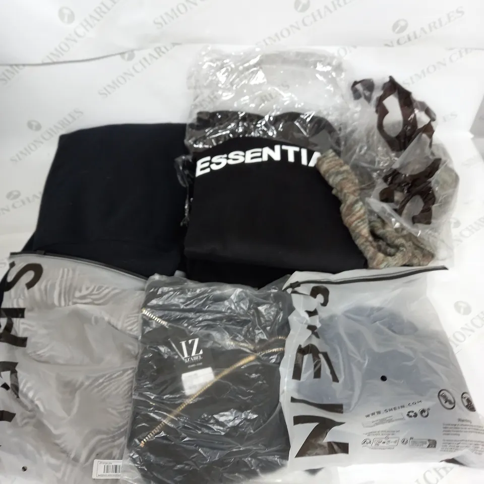 LARGE BOX OF ASSORTED CLOTHING ITEMS IN VARIOUS COLOURS AND SIZES INCLUDING TROUSERS , TOPS AND JUMPERS