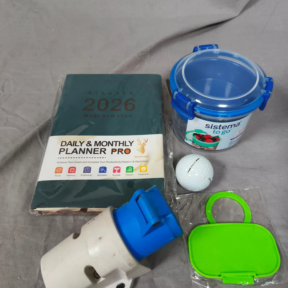 APPROXIMATELY 10 ASSORTED HOUSEHOLD PRODUCTS TO INCLUDE 2026 PLANNER, GOLF BALLS, FOOD CONTAINERS ETC