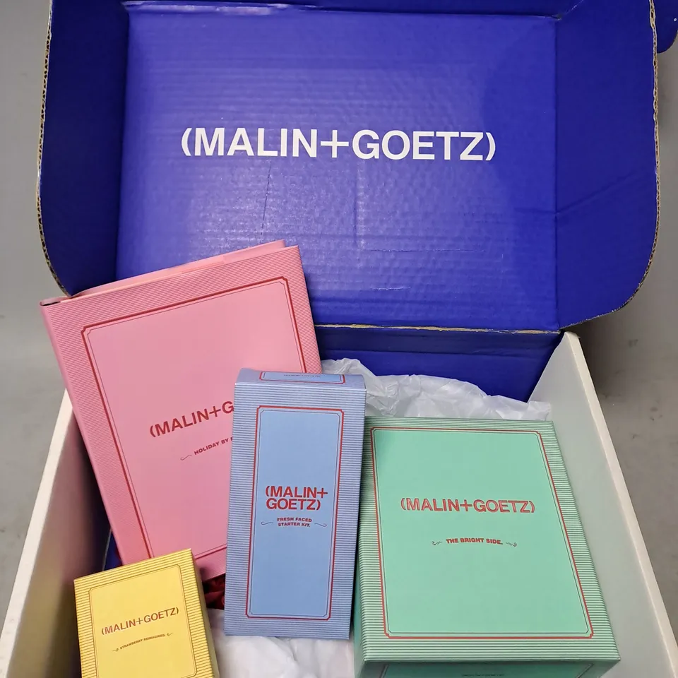 MALIN+GOETZ BOX OF APPROX 4 ASSORTED ITEMS TO INCLUDE - VITAMIN B5 BODY LOTION - STRAWBERRY PERFUME OIL - FRESH FACE STARTER SET - ETC