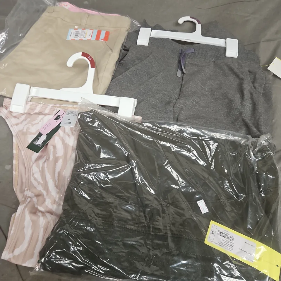APPROXIMATELY 35 ASSORTED CLOTHING ITEMS IN VARIOUS SIZES, STYLES & COLOURS TO INCLUDE ITEMS SUCHS AS WILD FABLE BOTTOMS, ALL IN MOTION FRENCH TERRY JOGGERS, CAT & JACK CHILDRENS TROUSERS, ETC - COLLE
