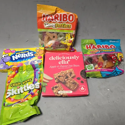 APPROXIMATELY 12 ASSORTED FOOD ITEMS TO INCLUDE - HARIBO SOUR SPARKS , NERDS , HARIBO TANGFASTICS ETC