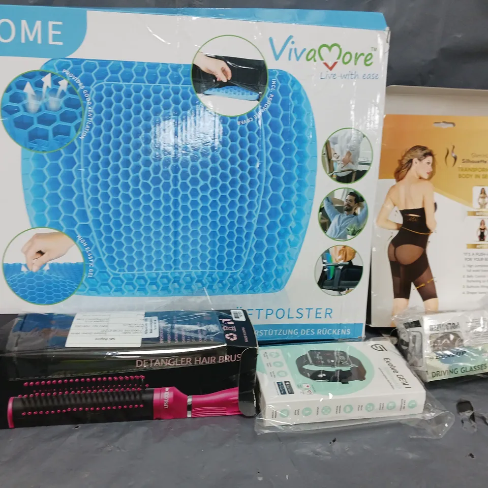 LARGE BOX OF ASSORTED HOUSEHOLD ITEMS TOO INCLUDE HAIR BRUSHES , WAIST CUSHIONS , DRIVING GLASSES , ETC 