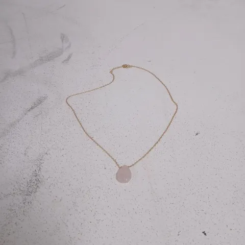 PINK PENDANT TEARDROP NECKLACE ON GOLD-TONE CHAIN WITH BLACK "SKULL" POUCH