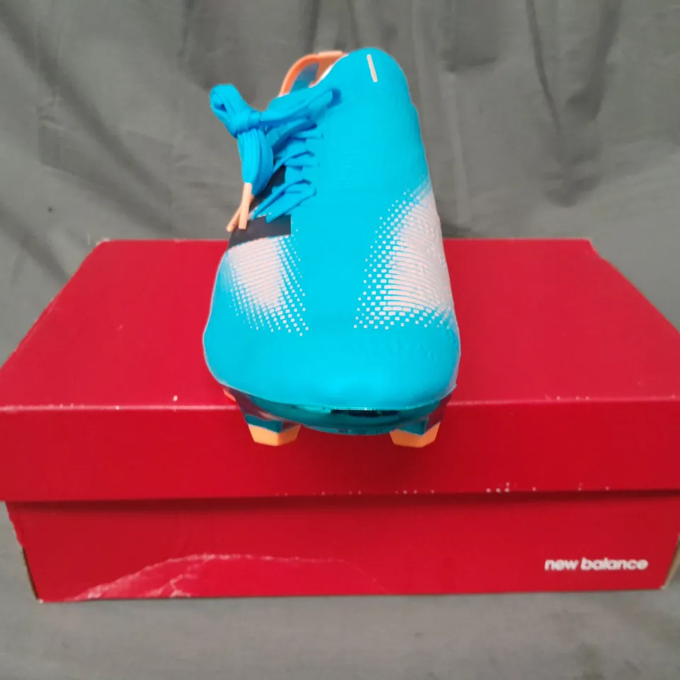 BOXED PAIR OF NEW BALANCE FURON FOOTBALL BOOTS IN SKY BLUE/ORANGE UK SIZE 10.5