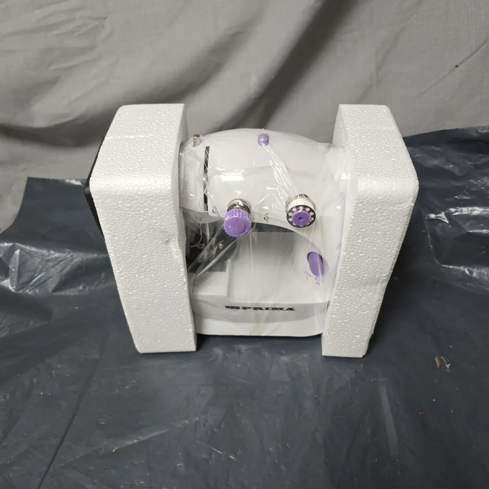 PRIMA HOUSEWARE ELECTRIC PORTABLE SEWING MACHINE BATTERY OR MAINS, WITH INSTRUCTIONS. BOXED