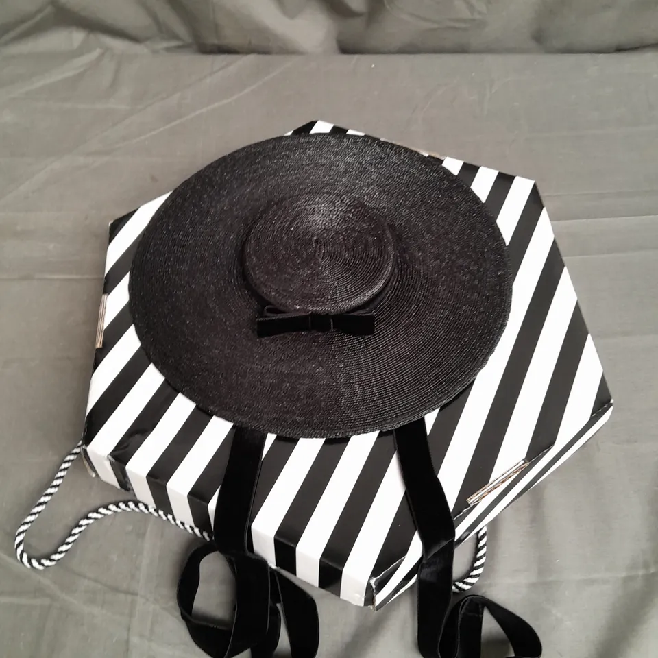 ORIZU MILLINERY WIDE-BRIMMED FLAT TIE HAT IN BLACK ONE SIZE 