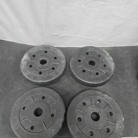 LOT OF 4 WEIGHT PLATES 1 X 1.5KG AND 3 BY 2KG