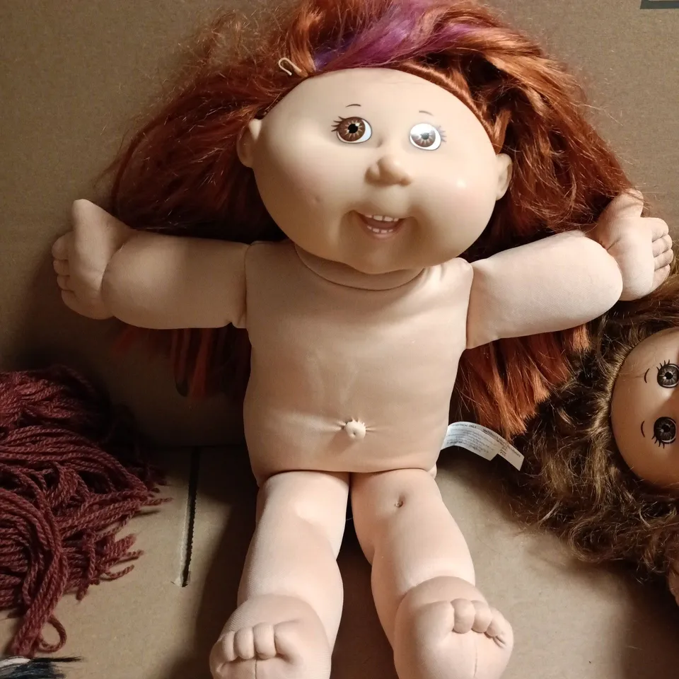 LOT OF 7 ASSORTED FABRIC KIDS DOLLS WITH VINYL HEADS