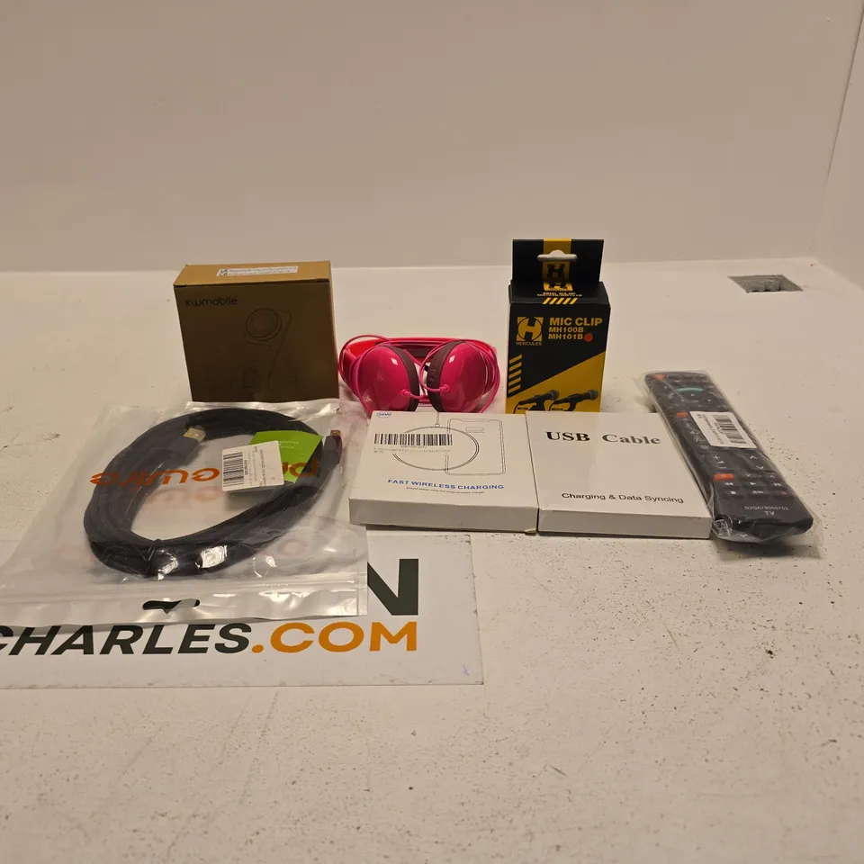 BOX OF APPROXIMATELY 28 ASSORTED ITEMS TO INCLUDE REMOTE CONTROL, CABLES, PINK HEADPHONES, WIRELESS CHARGING, MIC CLIP ETC