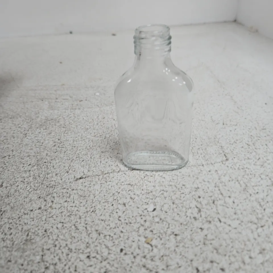 APPROXIMATELY 160 SMALL GLASS BOTTLES