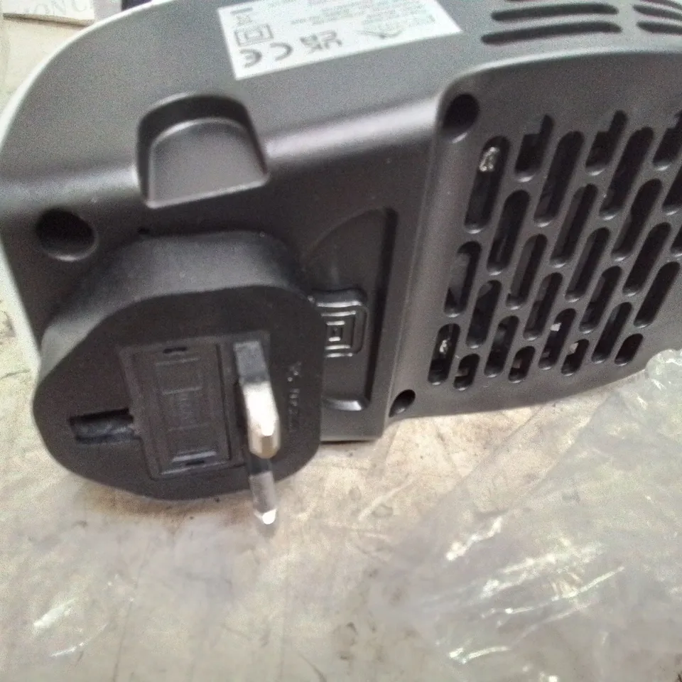 TWO BOXED 500 WATT PLUG IN HEATERS